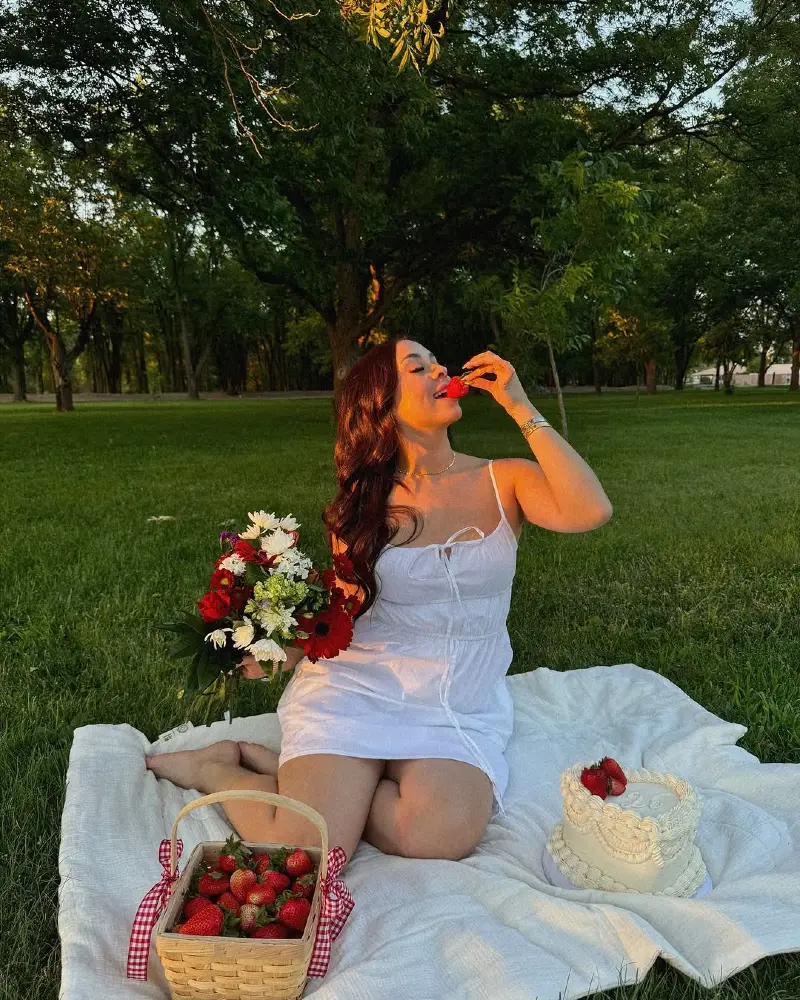 A Picnic with Cake and Flowers