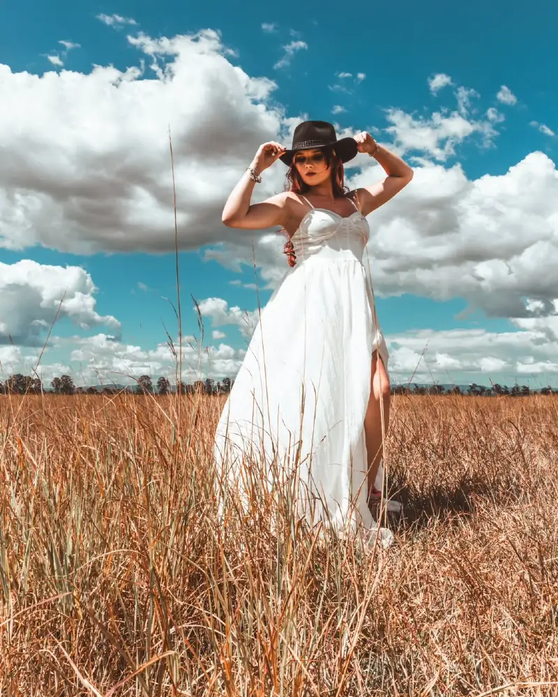 Hat and Flowy Dress in the Field