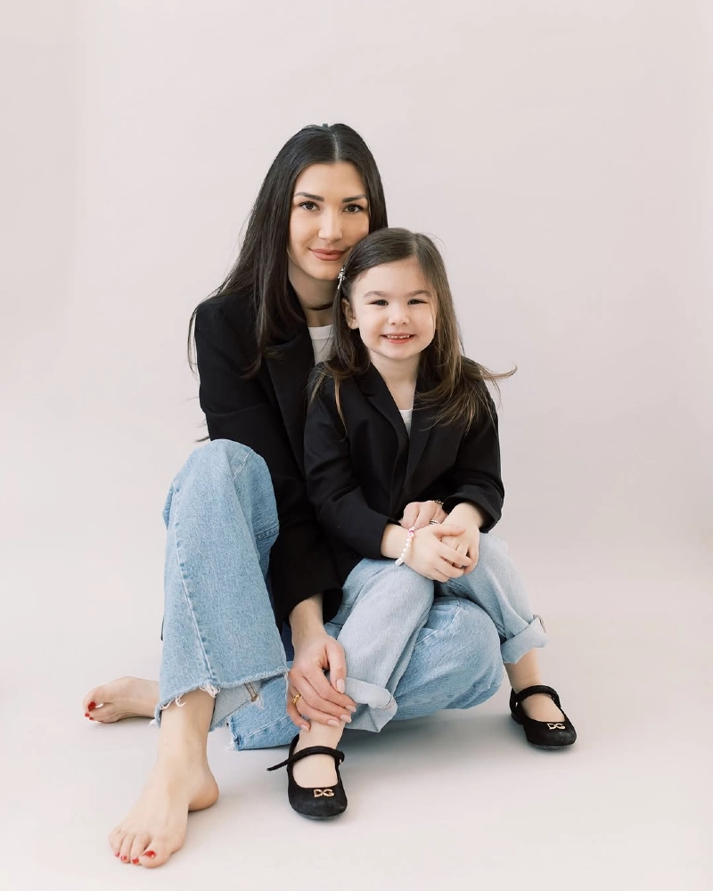 Mother and Daughter in Matching Blazers