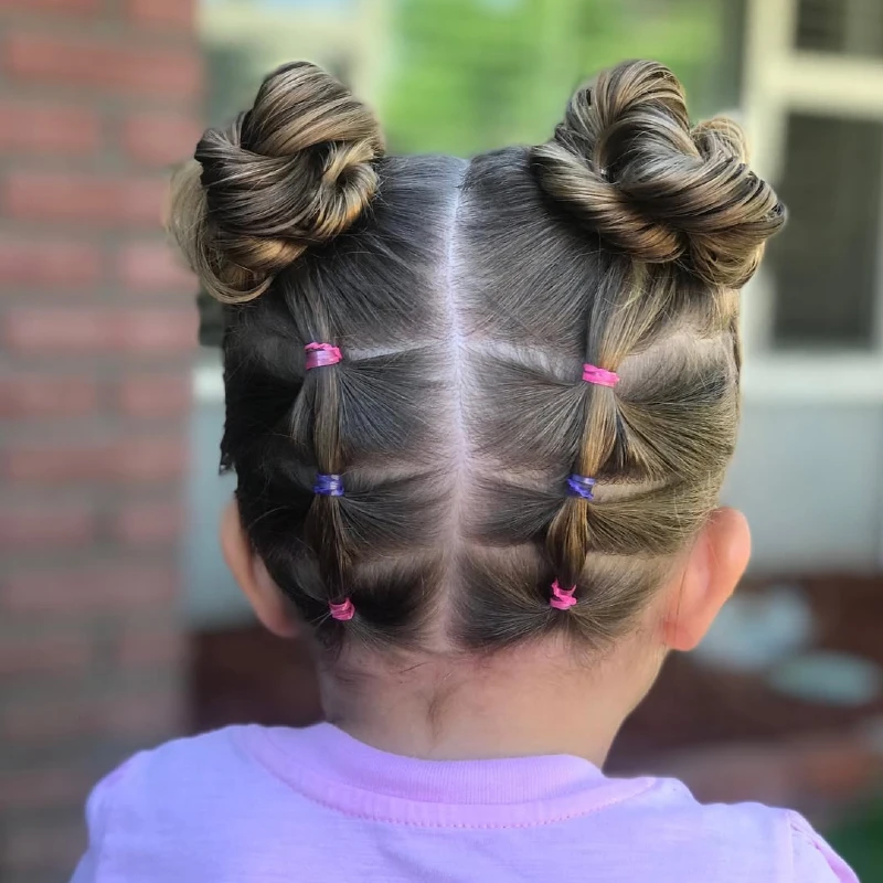 Playful Double Buns with Colorful Elastics