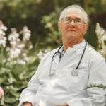 doctor-white-uniform-old-man-sitting-summer-park-senior-with-stethoscope