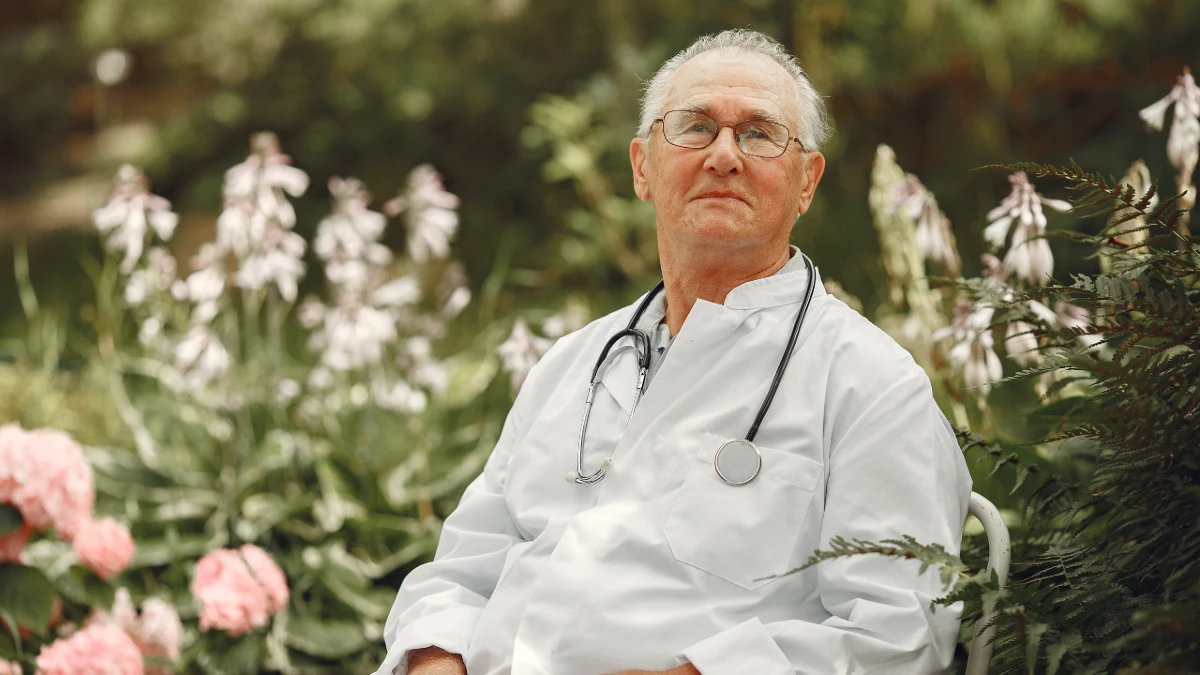 doctor-white-uniform-old-man-sitting-summer-park-senior-with-stethoscope