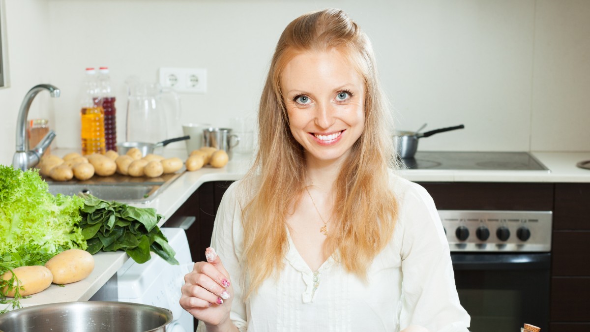 housewife cooking saltwater fish flour