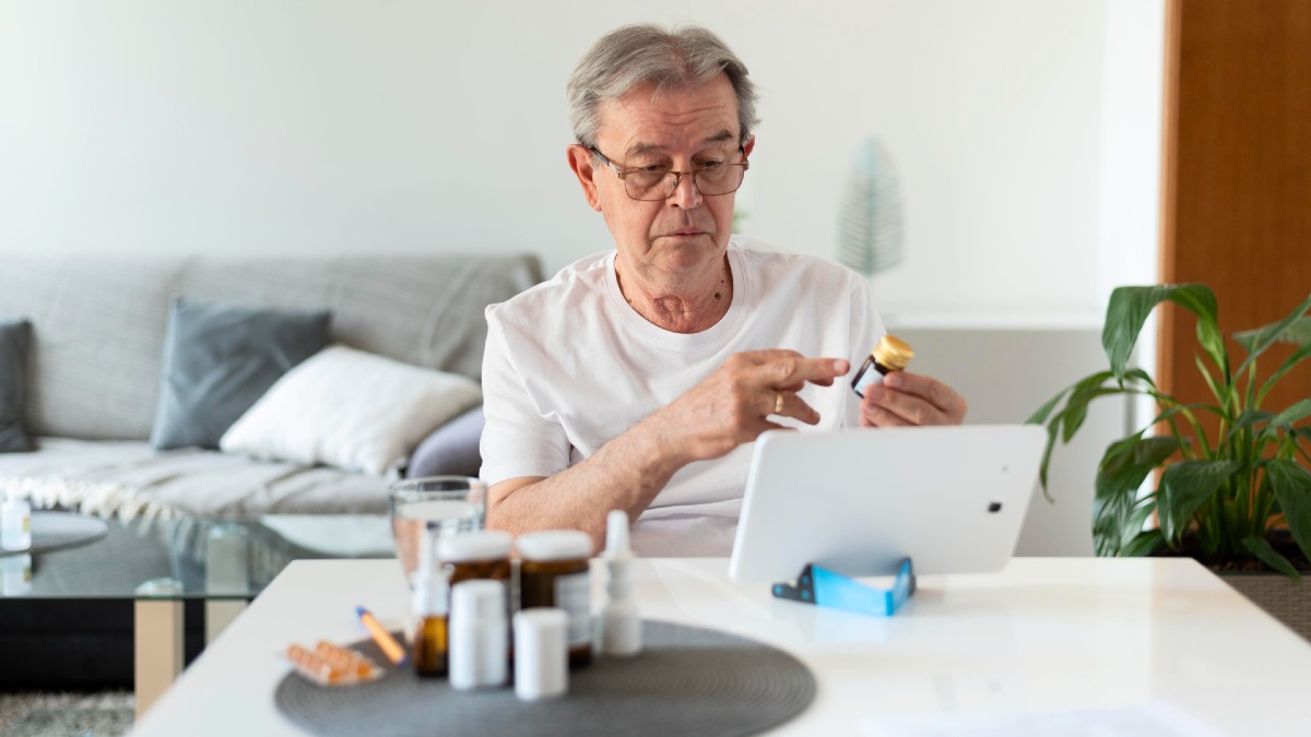 old man talking online doctor