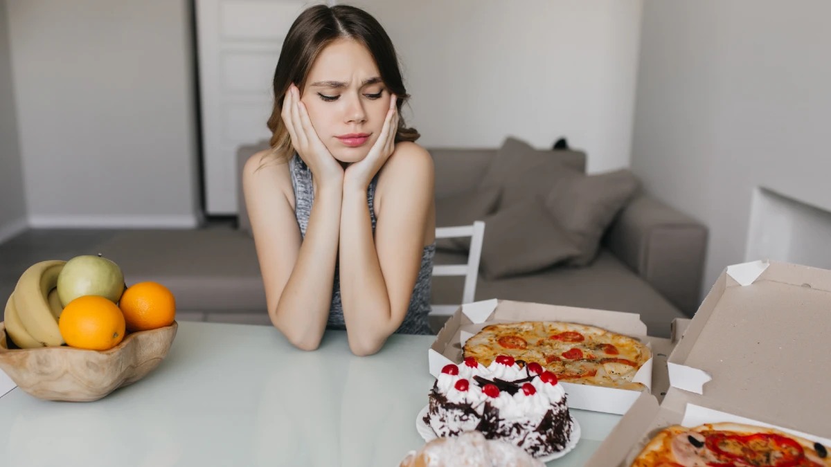 woman looking cake diet
