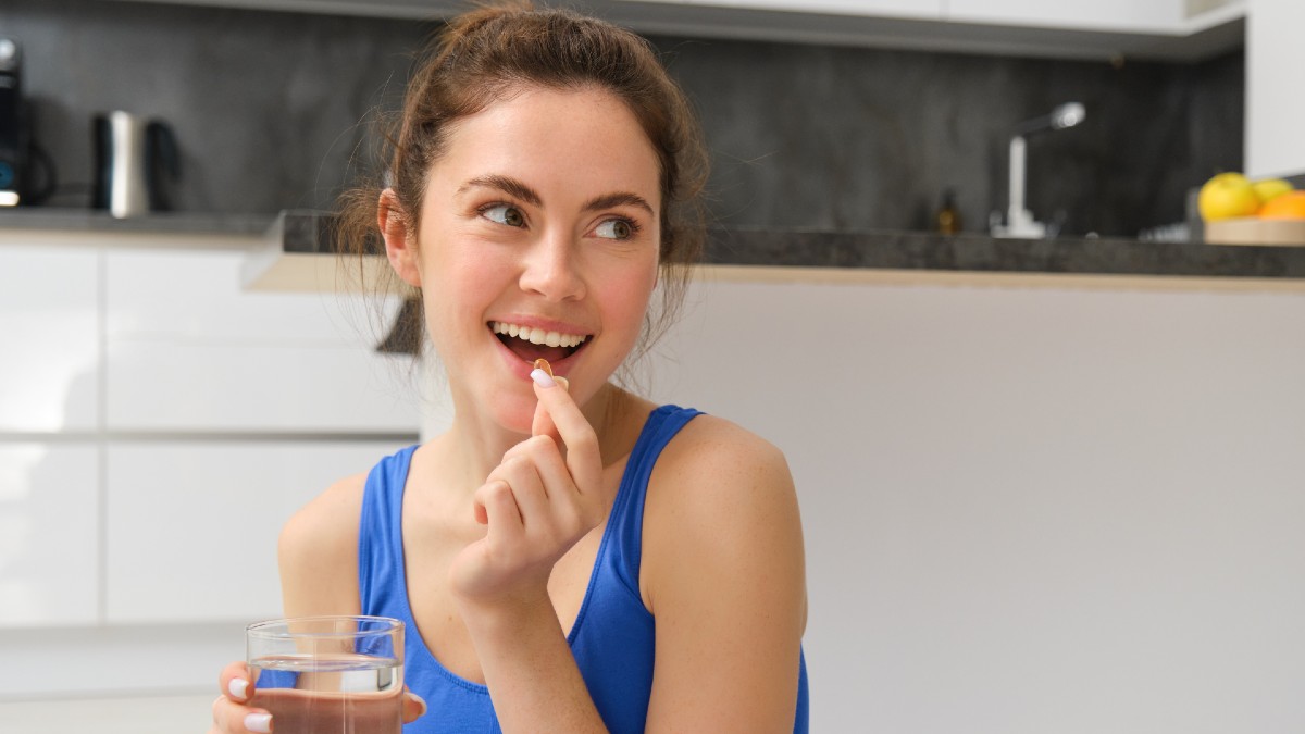 woman taking supplements
